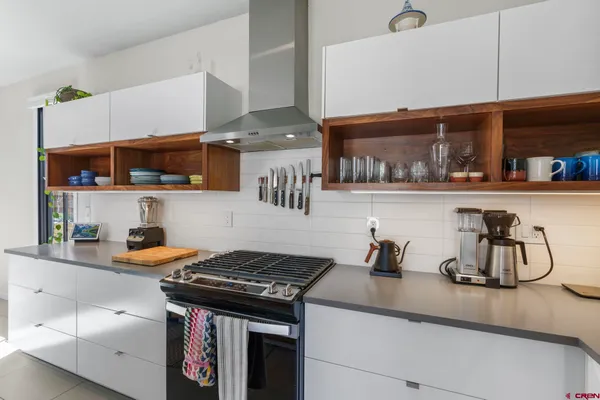 a view of a living room and dining room