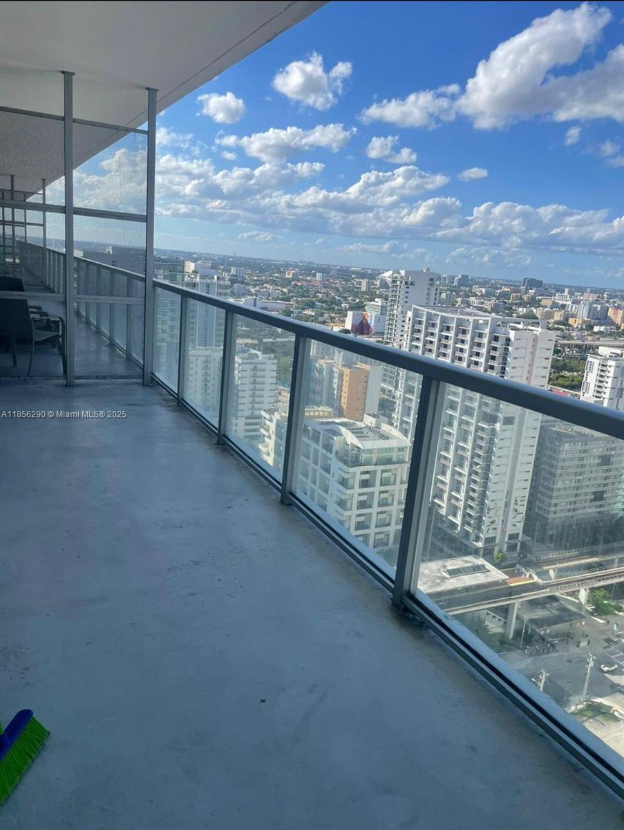 a view of balcony with city view