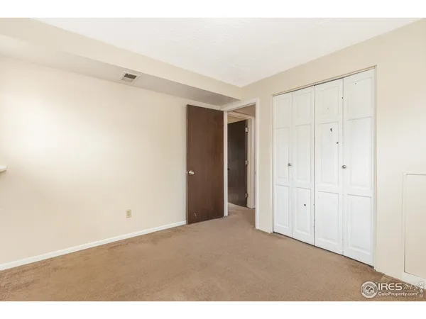 view of empty room with windows