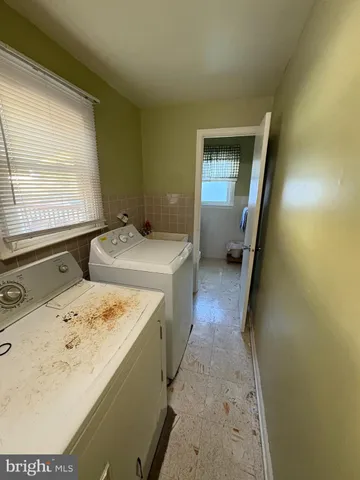 a bathroom with a sink a vanity and mirror