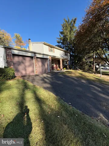 a view of outdoor space with wooden floor