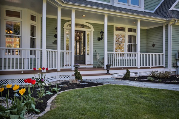18 Spring Grove Road Andover, MA 01810 - Photo 3 of 30 front view of a house with a garden