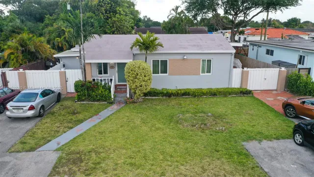 a aerial view of a house with garden