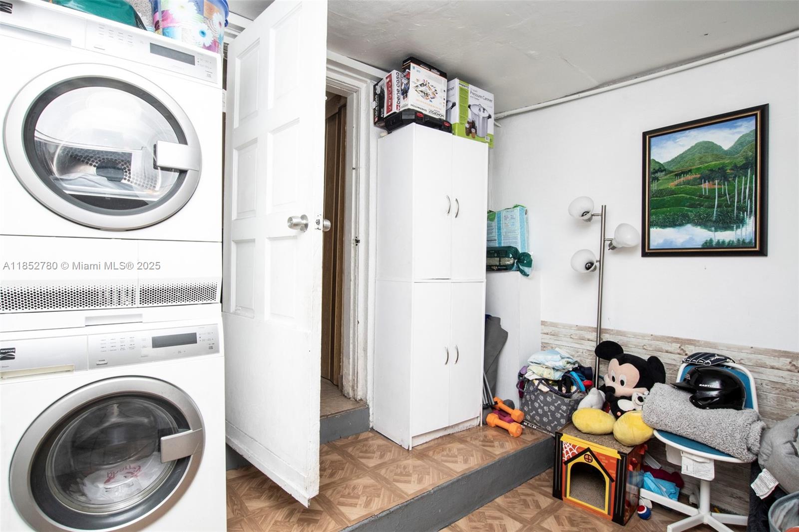 1721 Southwest 75th Avenue Road Miami, FL 33155 - Photo 9 of 13 a bathroom with a sink mirror and vanity