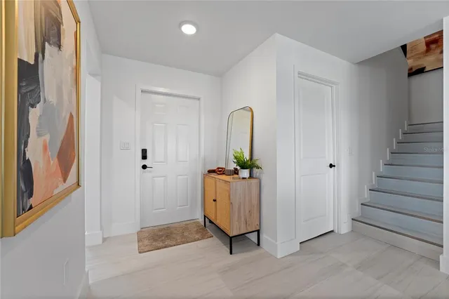 a view of entryway with livingroom