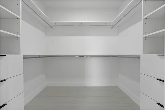 a view of an empty walk in closet