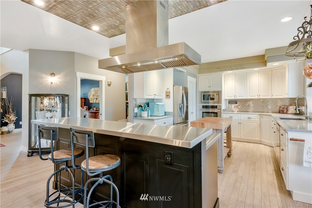 5432 Canvasback Road Blaine, WA 98230 - Photo 14 of 39 a kitchen with a sink appliances and cabinets