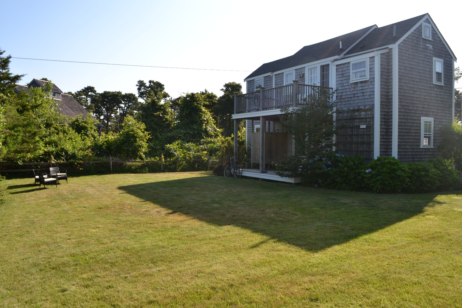 29 South A S Shore Road, Unit A Nantucket, MA 02554 - Photo 3 of 19 a view of a building with a yard