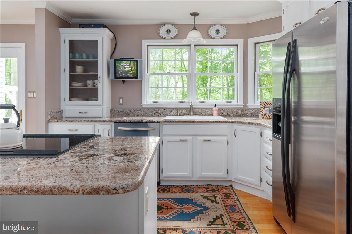 1900 Hidden Ridge Path Crownsville, MD 21032 - Photo 14 of 48 Kitchen has Granite/ Stainless Steel Appliances
