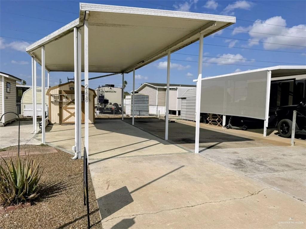 215 South Valley View Road Donna, TX 78537 - Photo 5 of 5 a view of a building with a patio