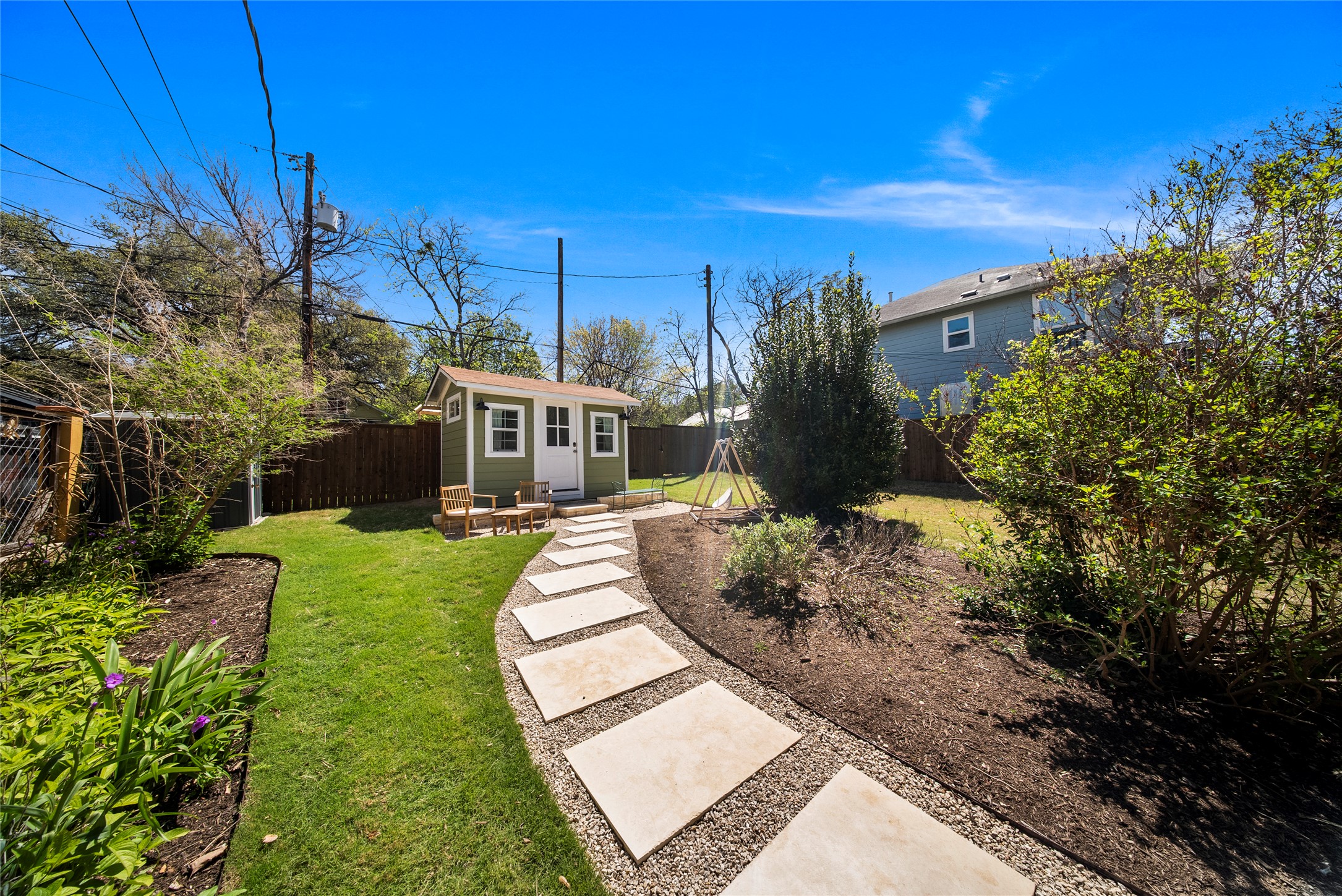 1809 Nickerson Street Austin, TX 78704 - Photo 27 of 31 Fenced backyard with a studio and a patio area