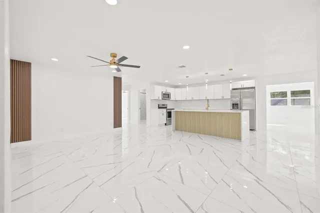 a view of a kitchen with a sink