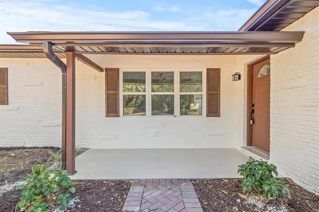 a front view of a house with a garage