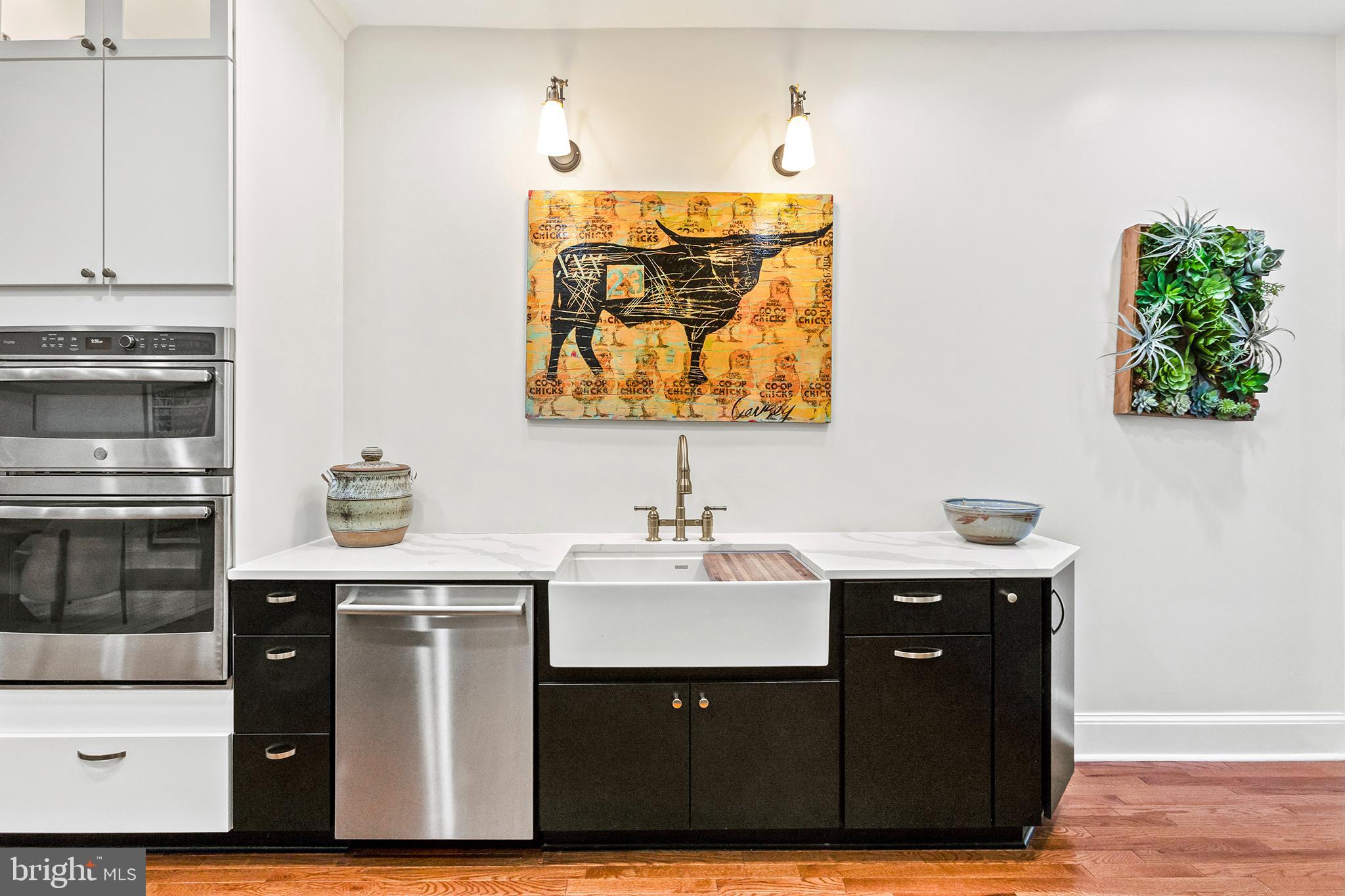 36 Quincy Place Northeast Washington, DC 20002 - Photo 10 of 29 a kitchen with a sink and cabinets