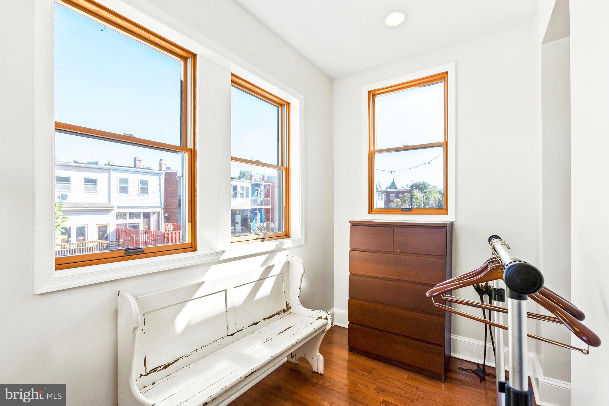 36 Quincy Place Northeast Washington, DC 20002 - Photo 19 of 29 a living room with furniture and a window