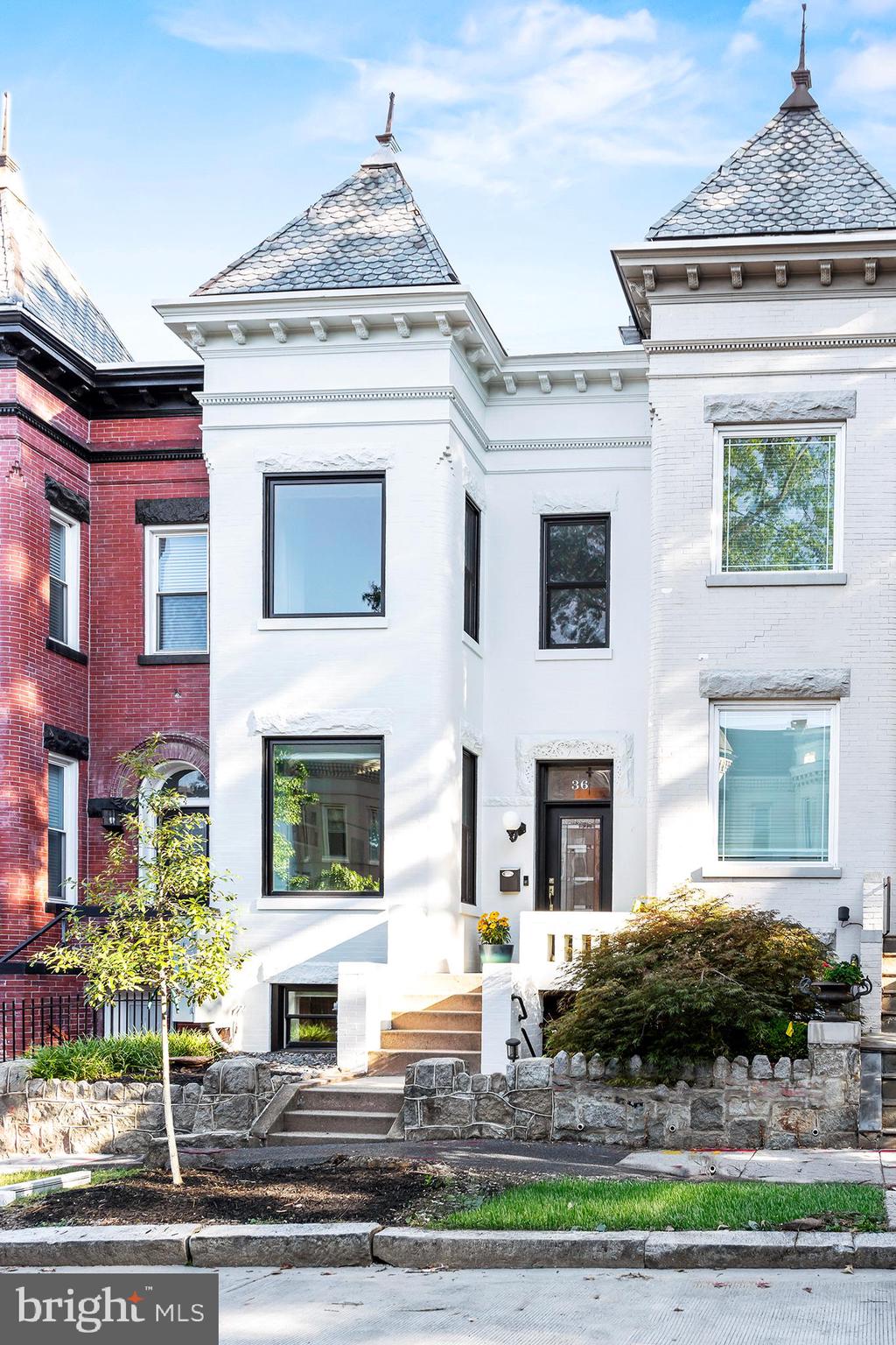 36 Quincy Place Northeast Washington, DC 20002 - Photo 2 of 29 a front view of a house with garden