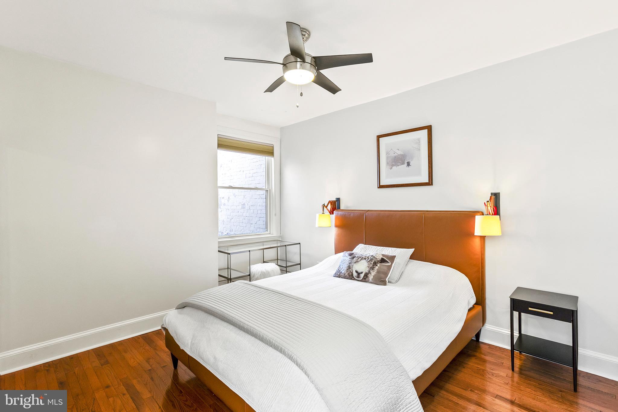 36 Quincy Place Northeast Washington, DC 20002 - Photo 20 of 29 a bedroom with a bed and window