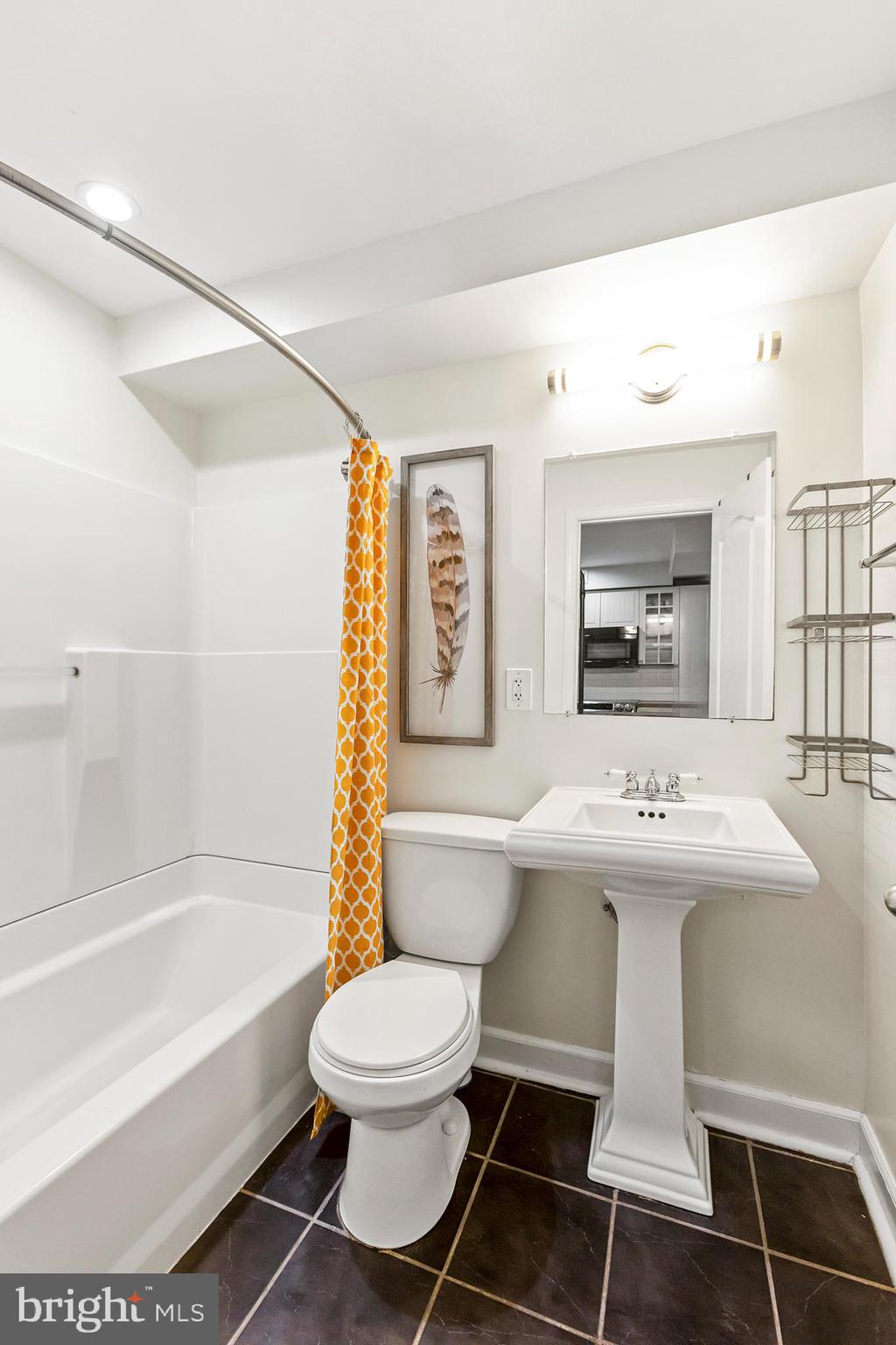 36 Quincy Place Northeast Washington, DC 20002 - Photo 28 of 29 a bathroom with a sink toilet and shower