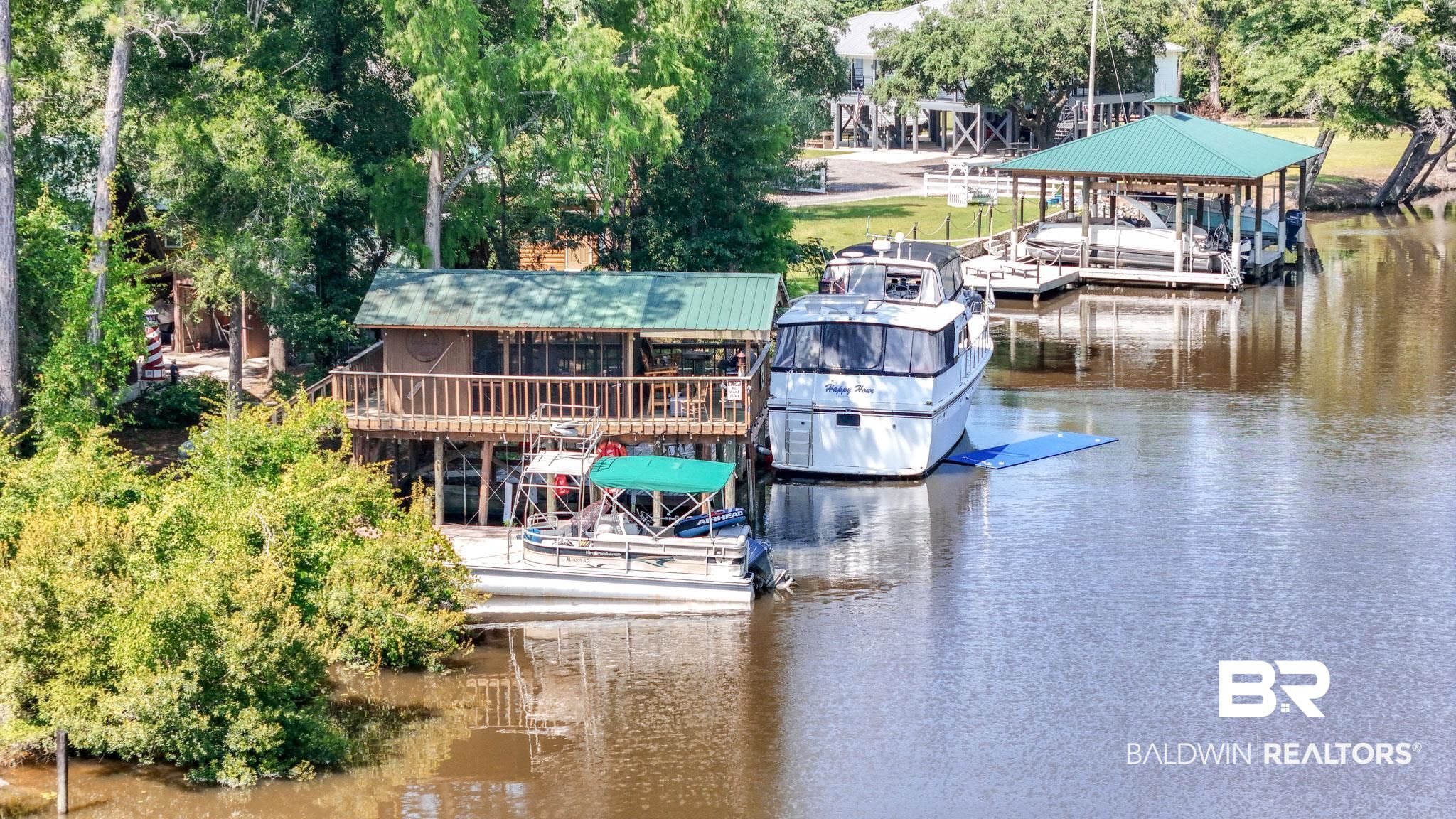 34341 Lost River Road Seminole, AL 36574 - Photo 36 of 36 Dock area with a water view and boat lift