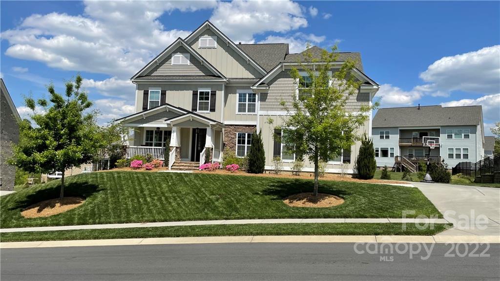 2250 Watermark Point Place, Unit 83 Fort Mill, SC 29708 - Photo 1 of 23 a front view of a house with a yard