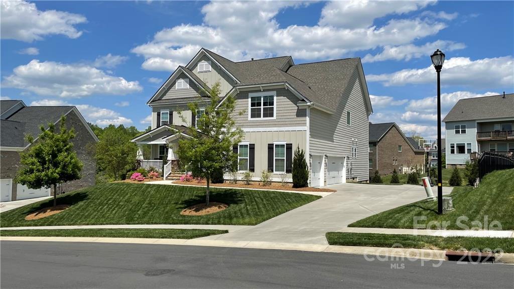2250 Watermark Point Place, Unit 83 Fort Mill, SC 29708 - Photo 2 of 23 a front view of a house with a yard