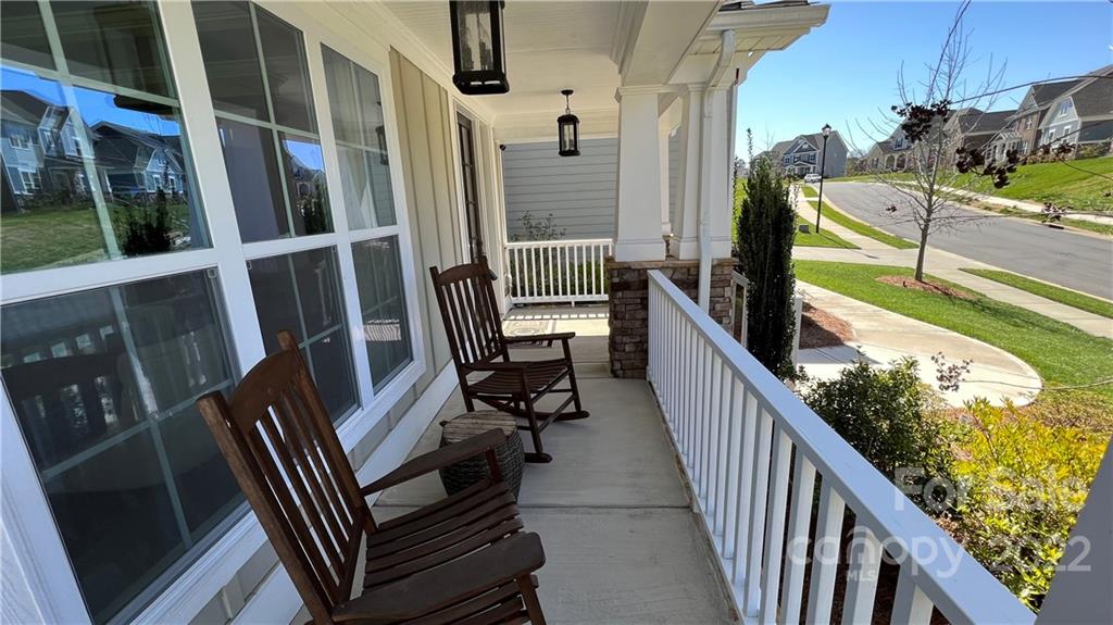 2250 Watermark Point Place, Unit 83 Fort Mill, SC 29708 - Photo 21 of 23 a view of a balcony with chairs
