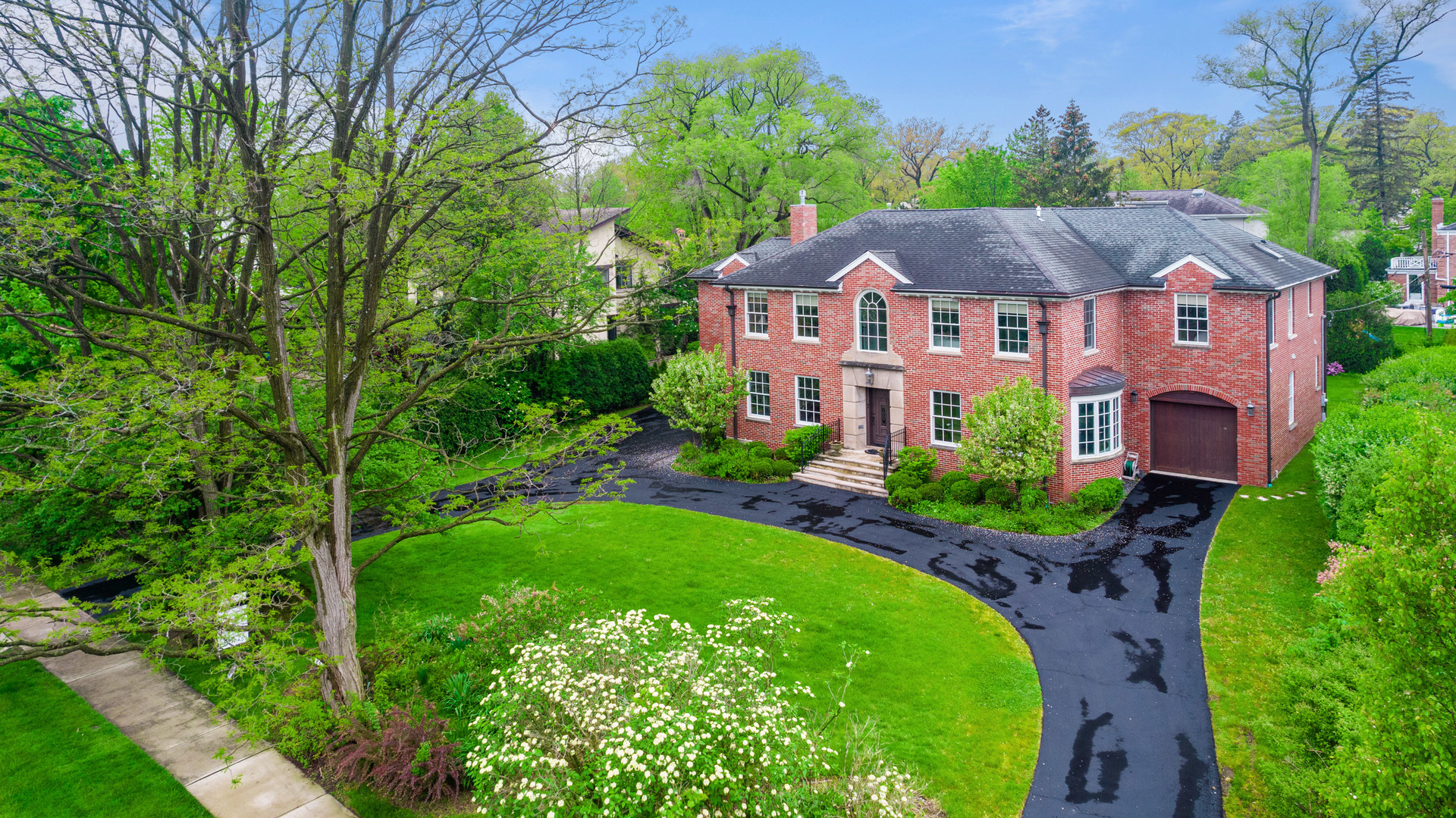 front view of a house with a garden