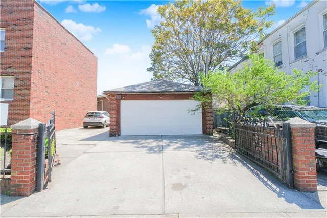 a view of a house with entrance gate