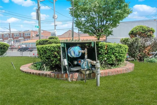 a garden with a bench in patio
