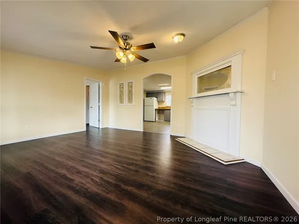 a view of a livingroom with wooden floor