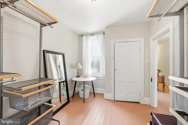 a bathroom with a glass shower door