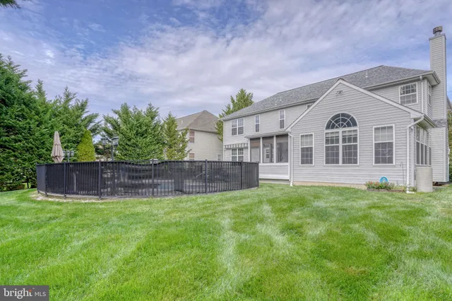 a view of entryway with wooden floor and stairs
