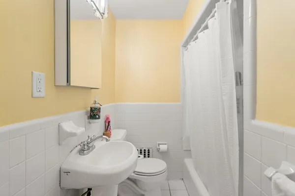 a bathroom with a sink and a toilet