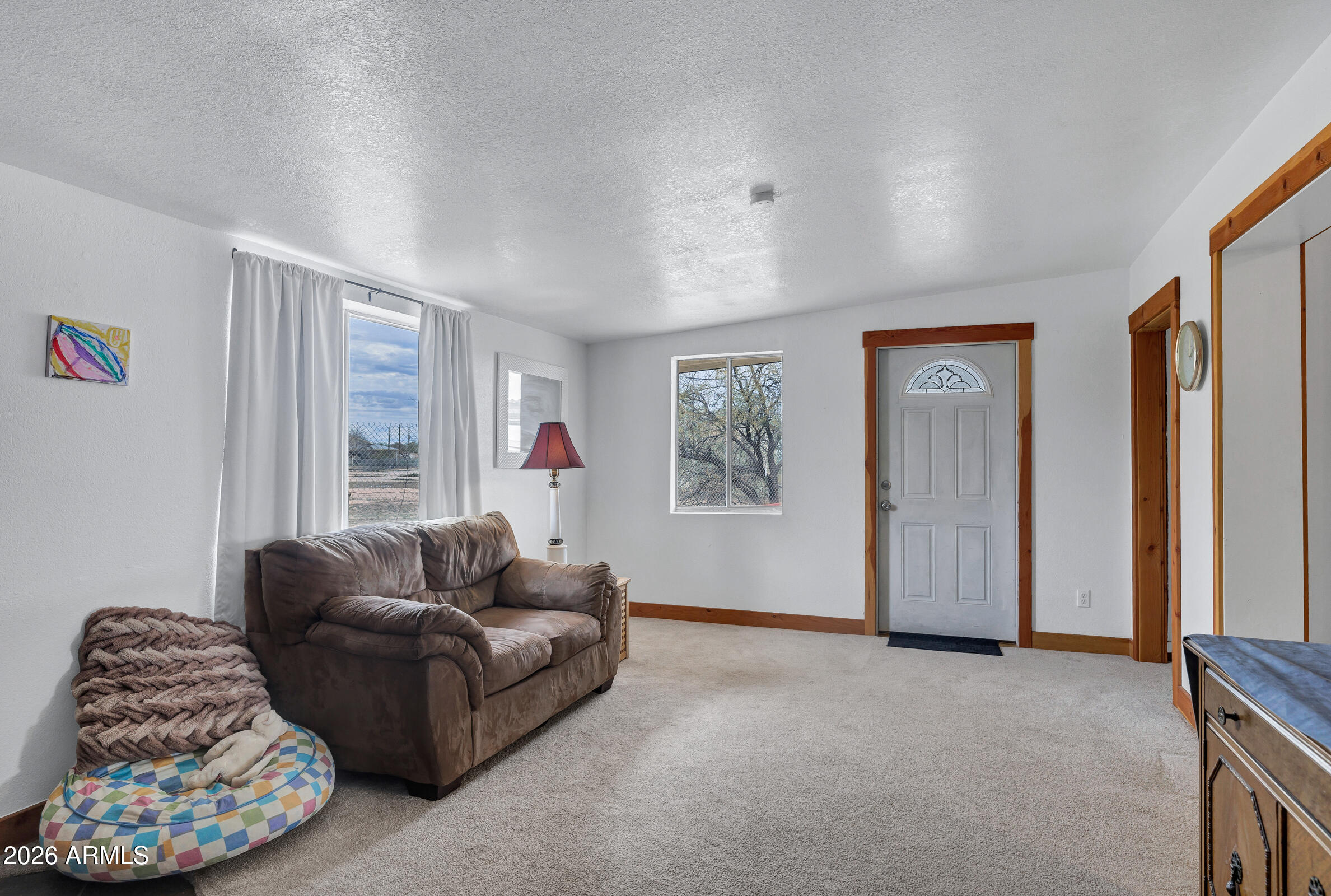 6618 North Evans Road Coolidge, AZ 85128 - Photo 17 of 48 a living room with furniture and a window