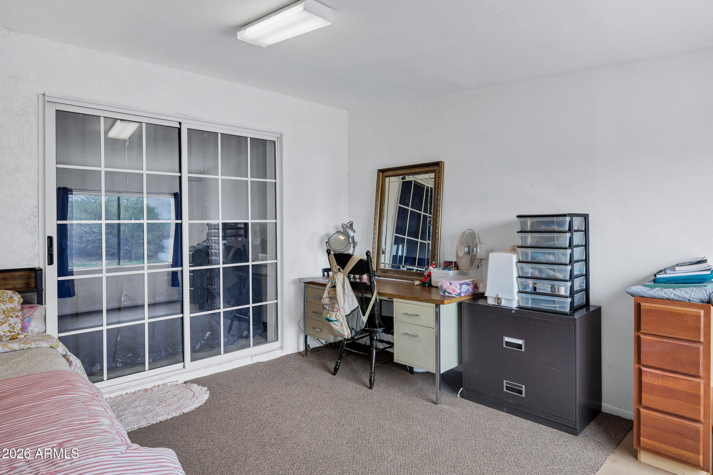 6618 North Evans Road Coolidge, AZ 85128 - Photo 20 of 48 a view of a workspace with furniture and a window