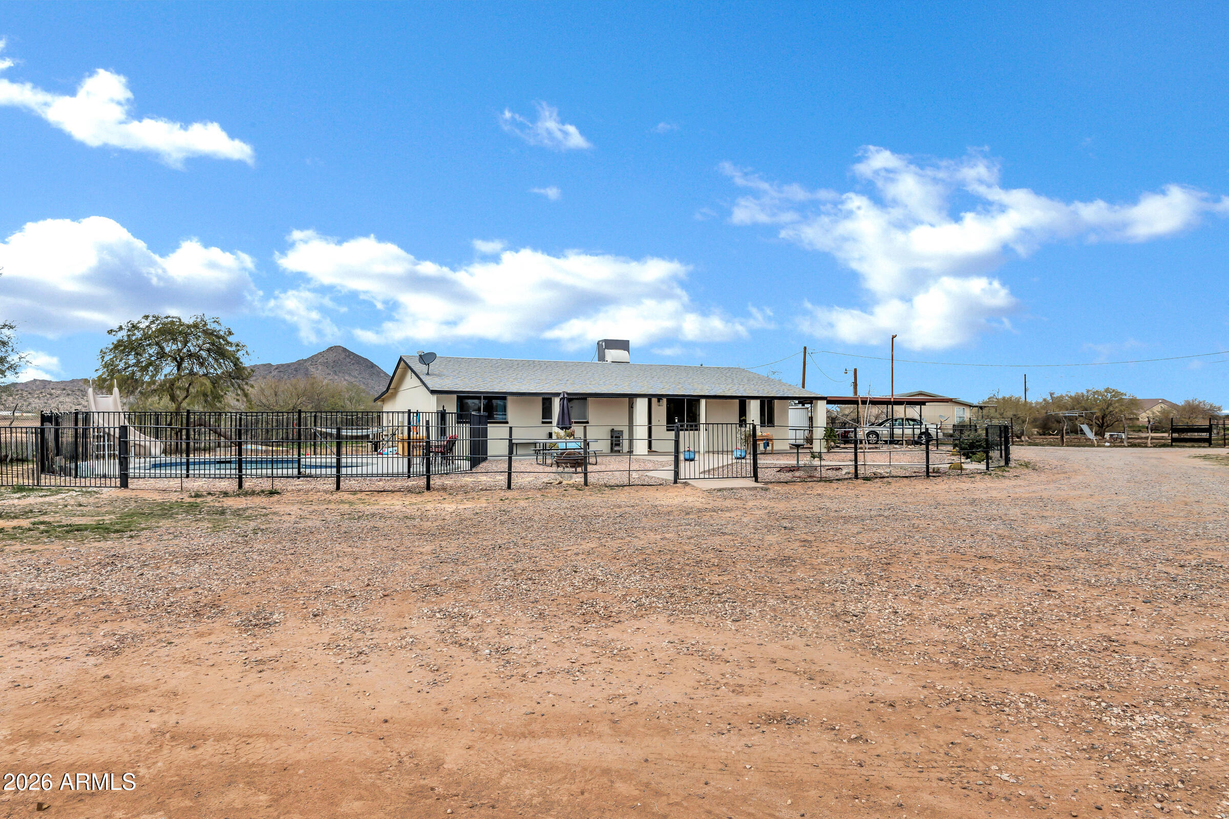 6618 North Evans Road Coolidge, AZ 85128 - Photo 2 of 48 a view of a house with a yard