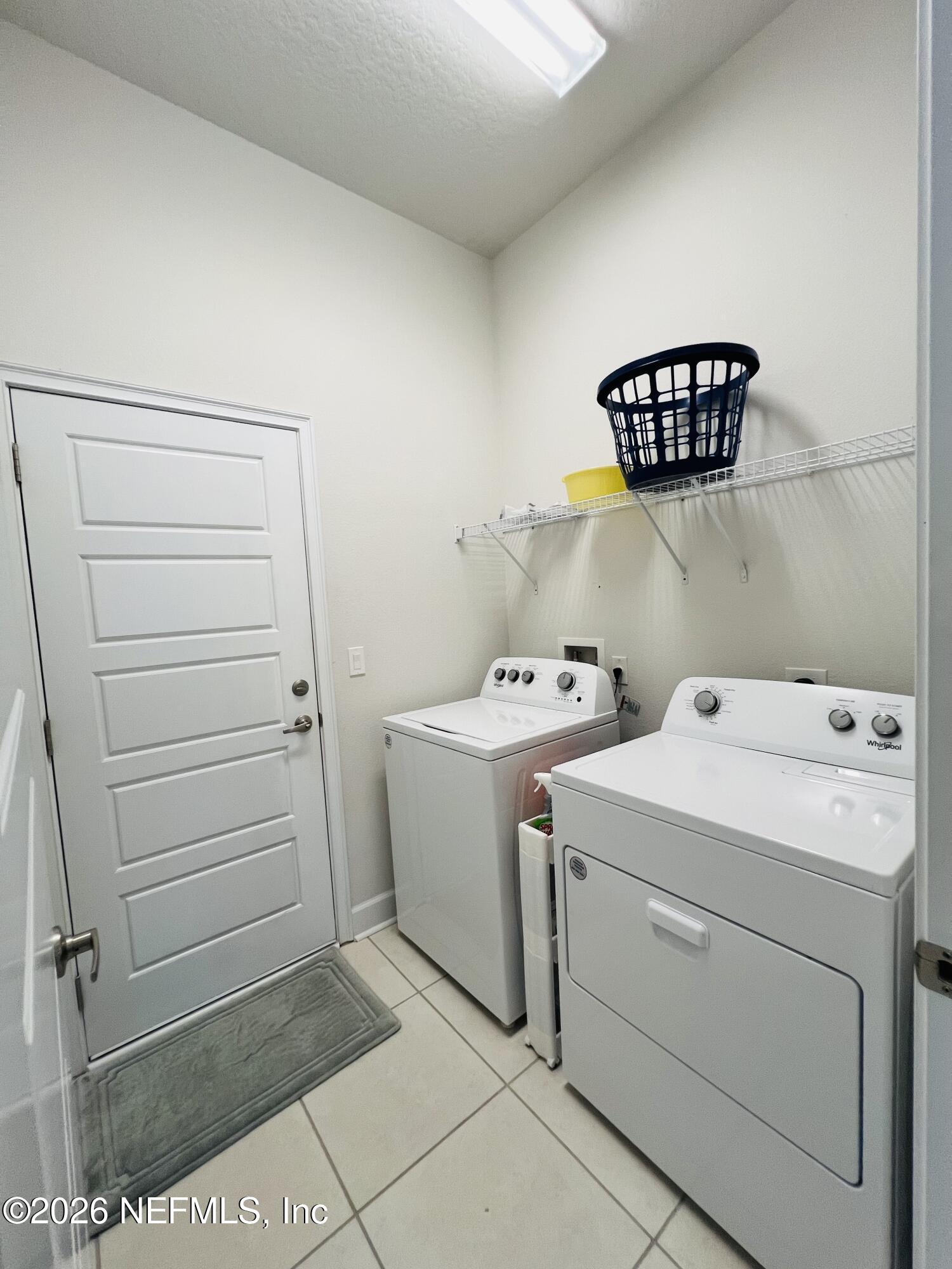 2 Rivertown Road Palm Coast, FL 32137 - Photo 42 of 80 a utility room with dryer and washer