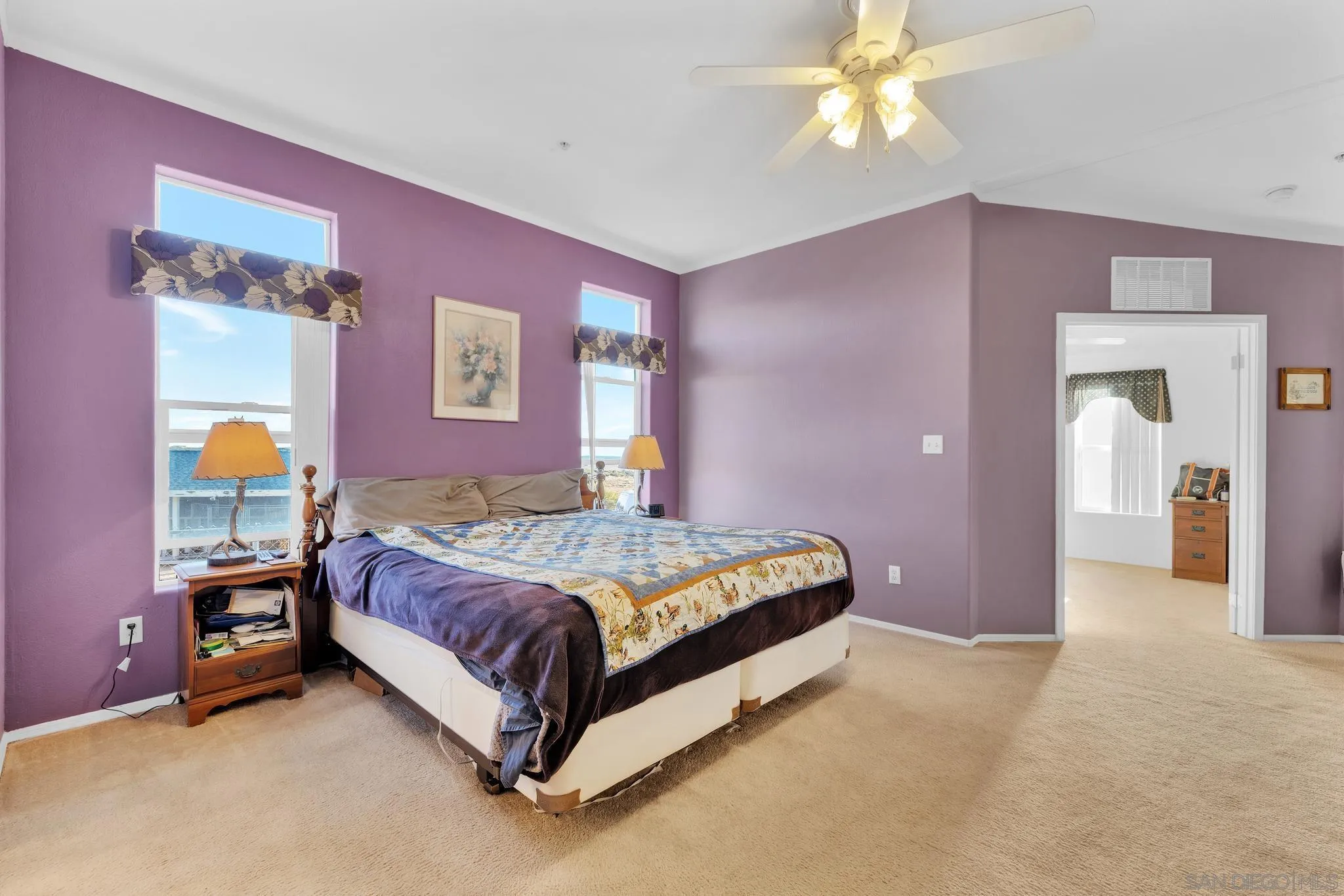3240 Chimney Rock Road Ranchita, CA 92066 - Photo 14 of 34 a spacious bedroom with a bed and a chandelier