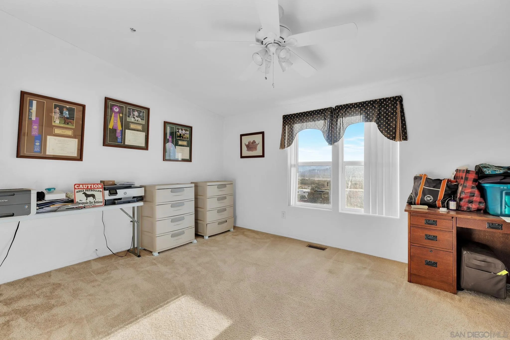 3240 Chimney Rock Road Ranchita, CA 92066 - Photo 15 of 34 a view of a bedroom with workspace and a window