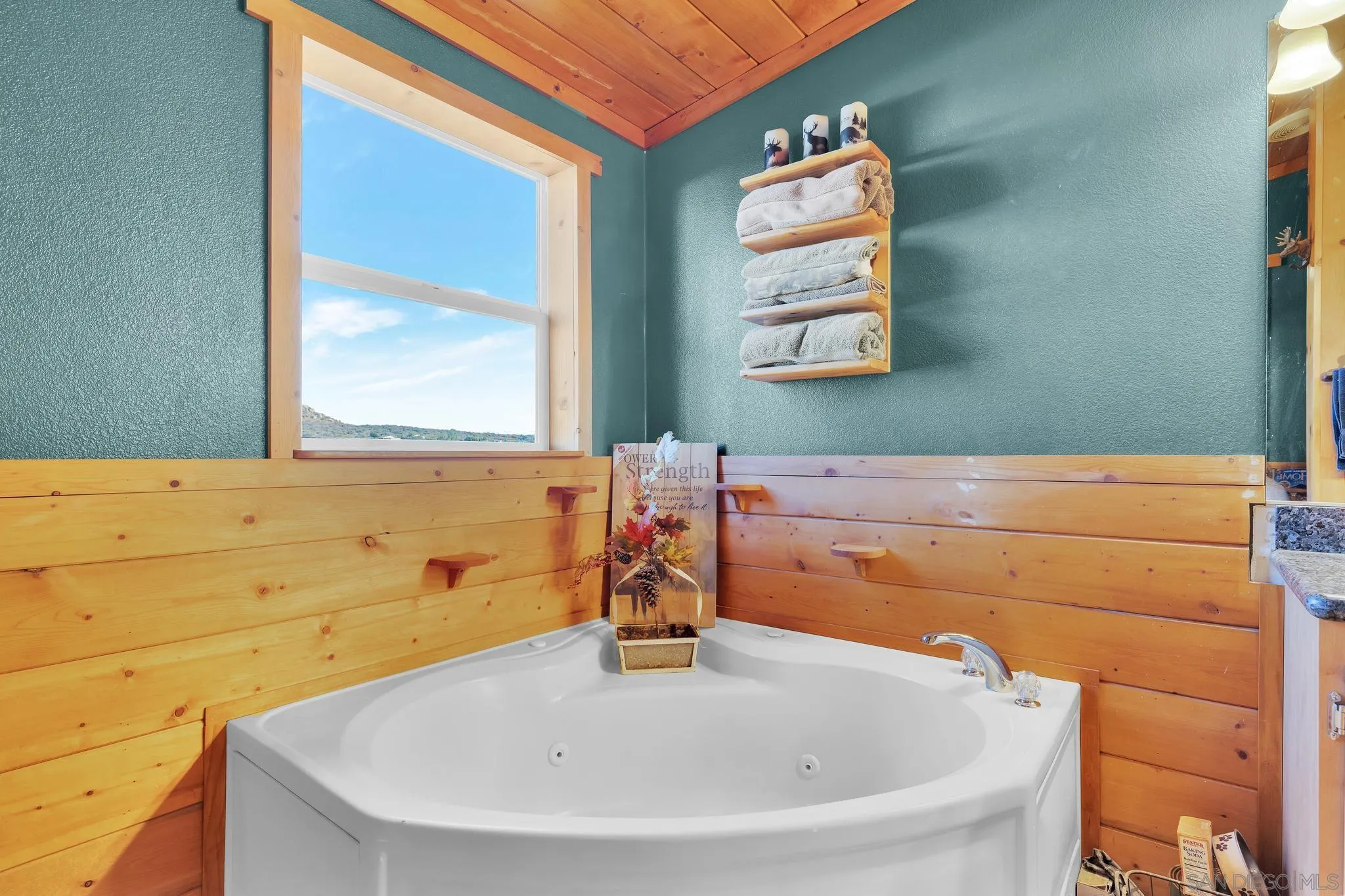 3240 Chimney Rock Road Ranchita, CA 92066 - Photo 18 of 34 a bathroom with a sink and a window