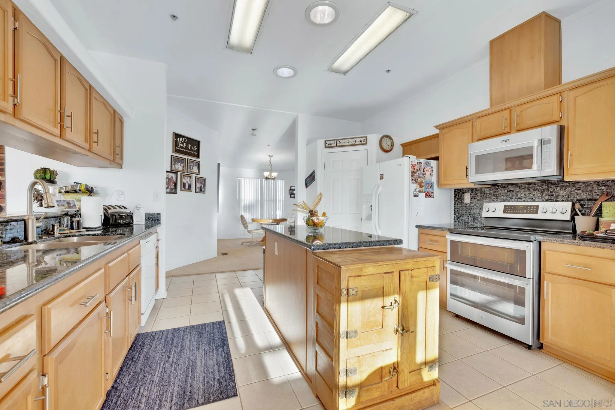 3240 Chimney Rock Road Ranchita, CA 92066 - Photo 20 of 34 a large kitchen with stainless steel appliances granite countertop a stove and a sink