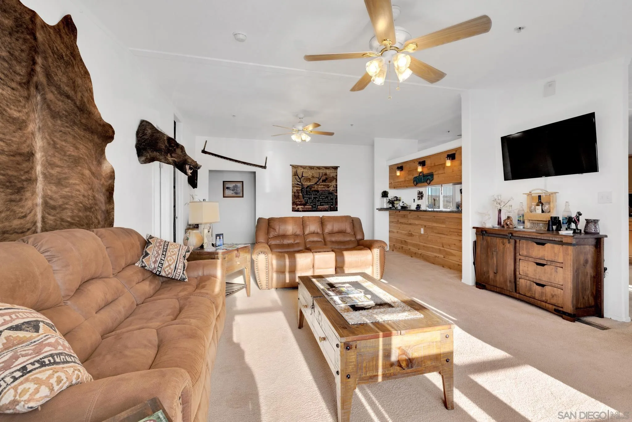 3240 Chimney Rock Road Ranchita, CA 92066 - Photo 2 of 34 a living room with furniture and a flat screen tv