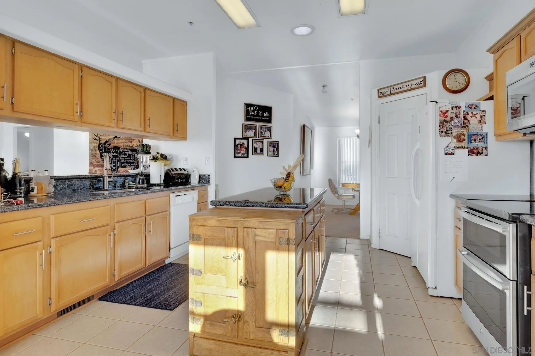 3240 Chimney Rock Road Ranchita, CA 92066 - Photo 21 of 34 a kitchen with stainless steel appliances granite countertop a refrigerator and a stove top oven