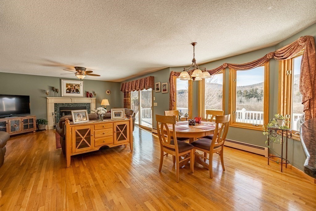 158 Scantic Road Hampden, MA 01036 - Photo 11 of 42 a view of a livingroom with furniture window and wooden floor