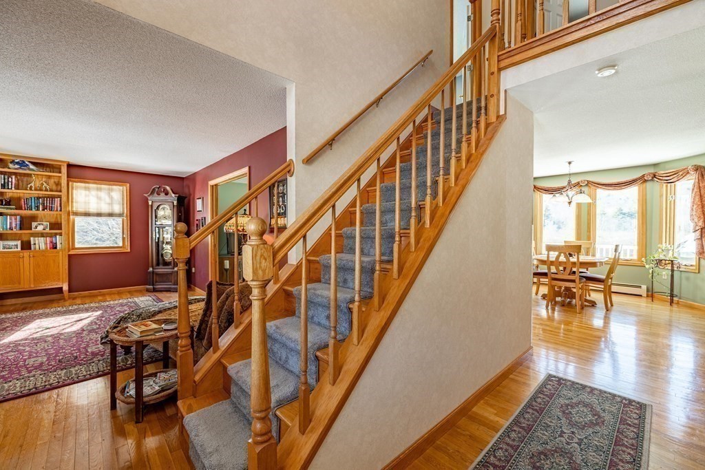 158 Scantic Road Hampden, MA 01036 - Photo 17 of 42 a view of entryway and hall with wooden floor