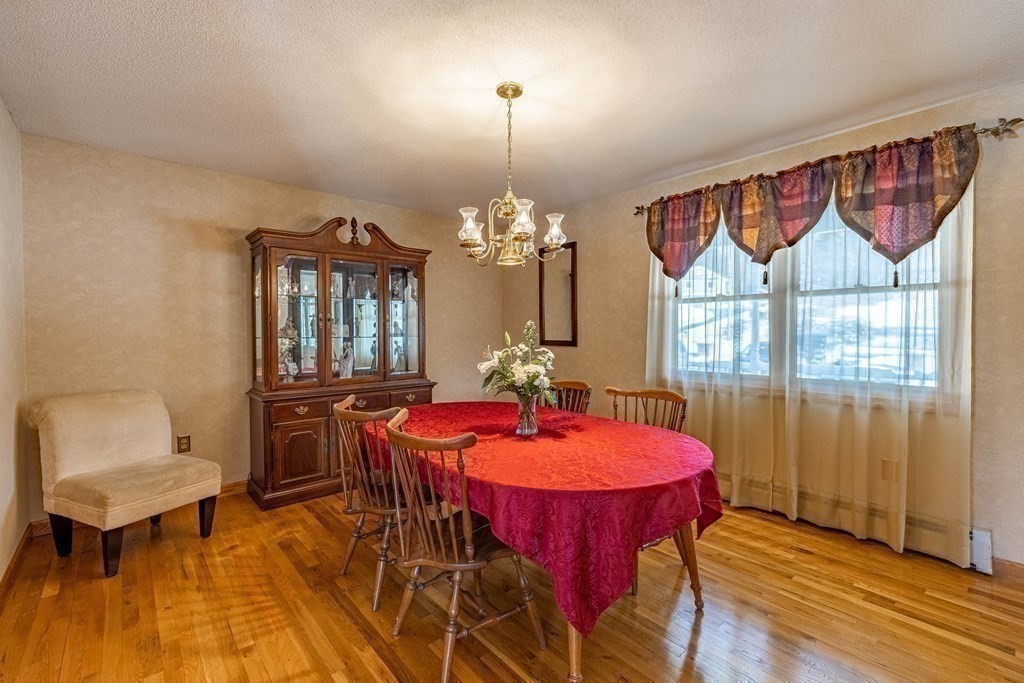 158 Scantic Road Hampden, MA 01036 - Photo 18 of 42 a view of a dining room with furniture window and wooden floor