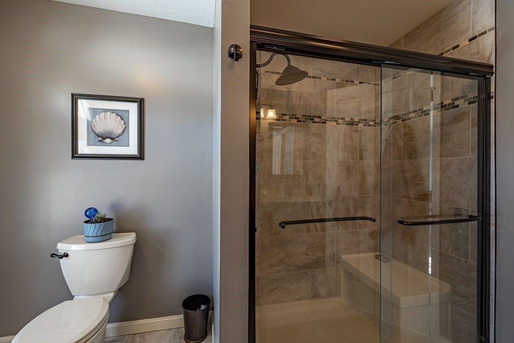 158 Scantic Road Hampden, MA 01036 - Photo 23 of 42 a bathroom with a toilet and a shower