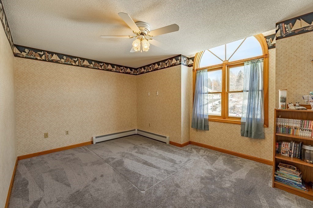158 Scantic Road Hampden, MA 01036 - Photo 26 of 42 a view of a room with window and a ceiling fan