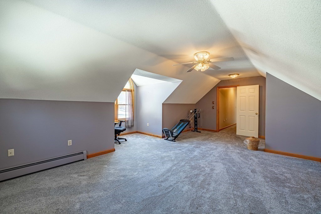158 Scantic Road Hampden, MA 01036 - Photo 29 of 42 an empty room with a ceiling fan and window