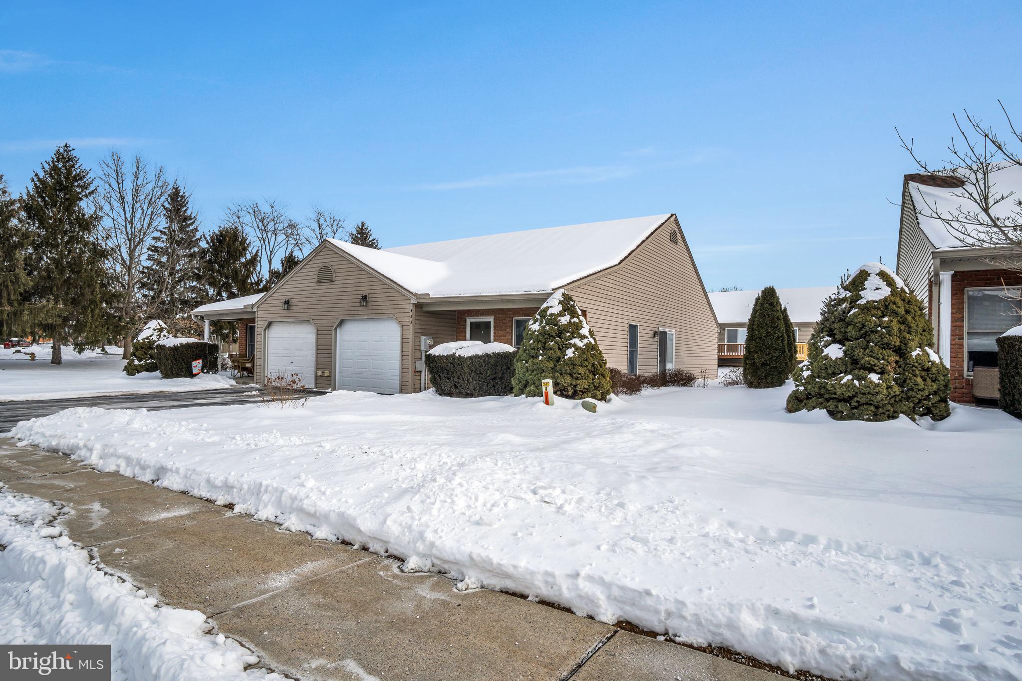 433 Mill Race Road Carlisle, PA 17013 - Photo 3 of 27 a view of a house with a yard and garage